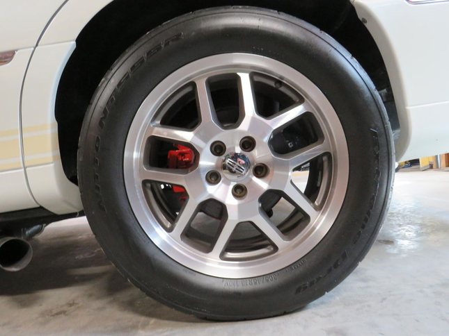 Image of the rear wheel of a town car 